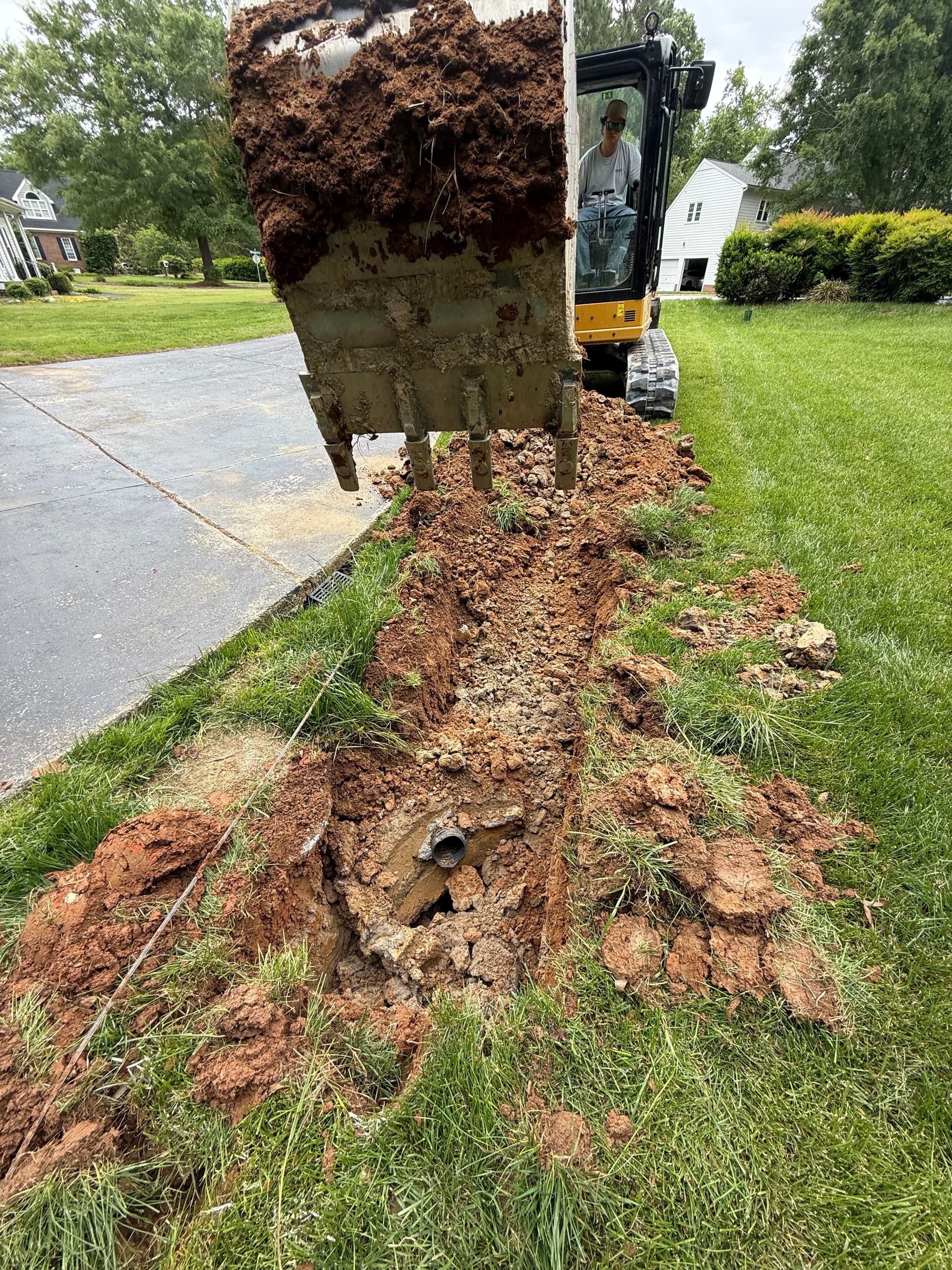 Gallery photos for Failed Concrete Pipe Replaced With Proper Drainage Tile: Image #3